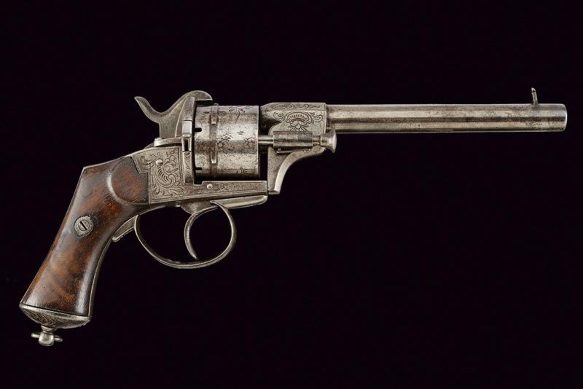 A pin fire revolver