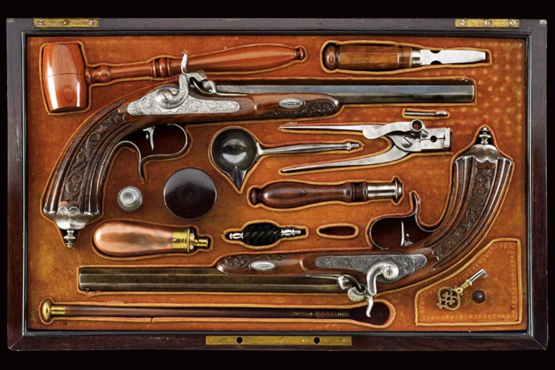 A fine pair of cased percussion pistols by Jaquet