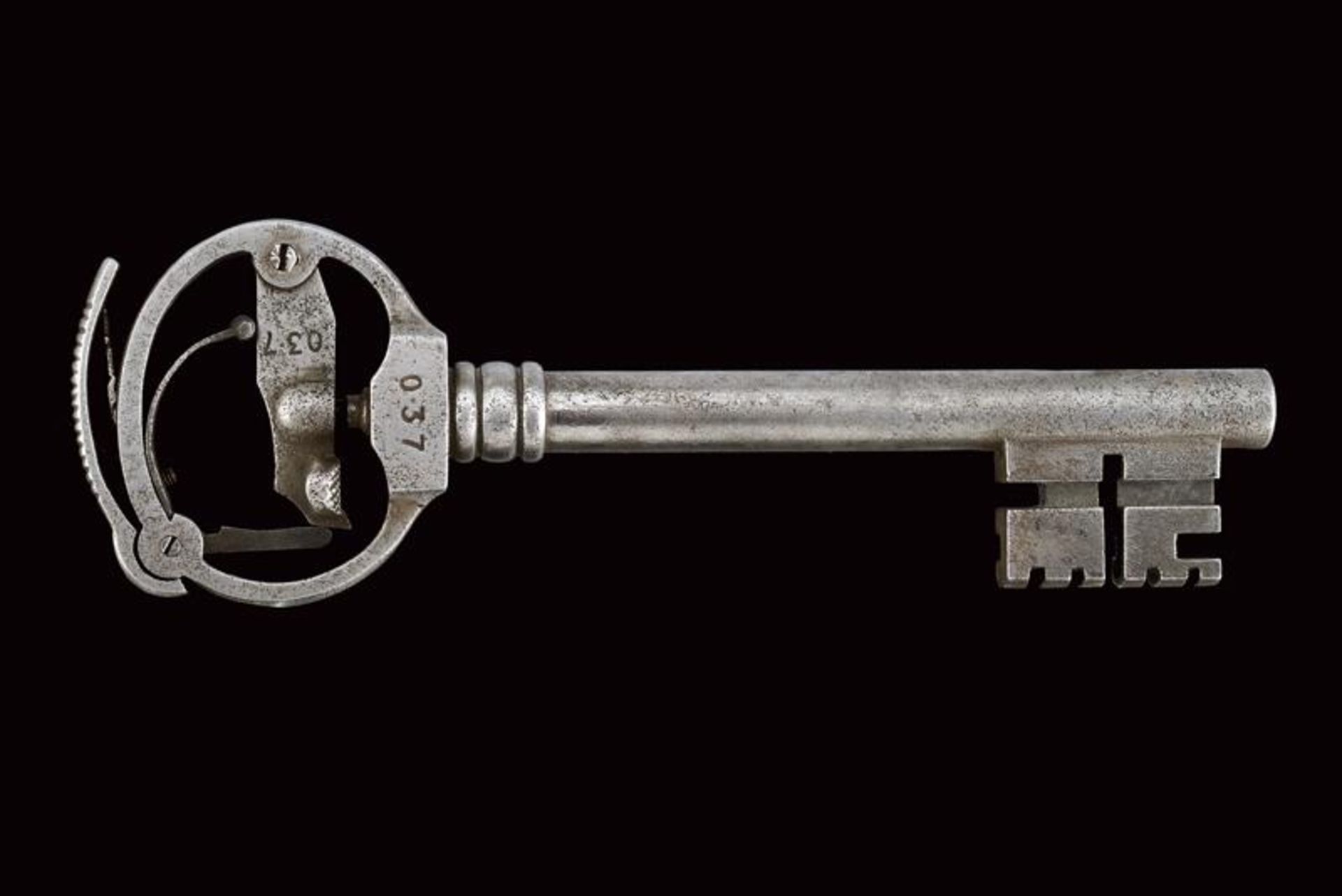 A rare key with percussion pistol