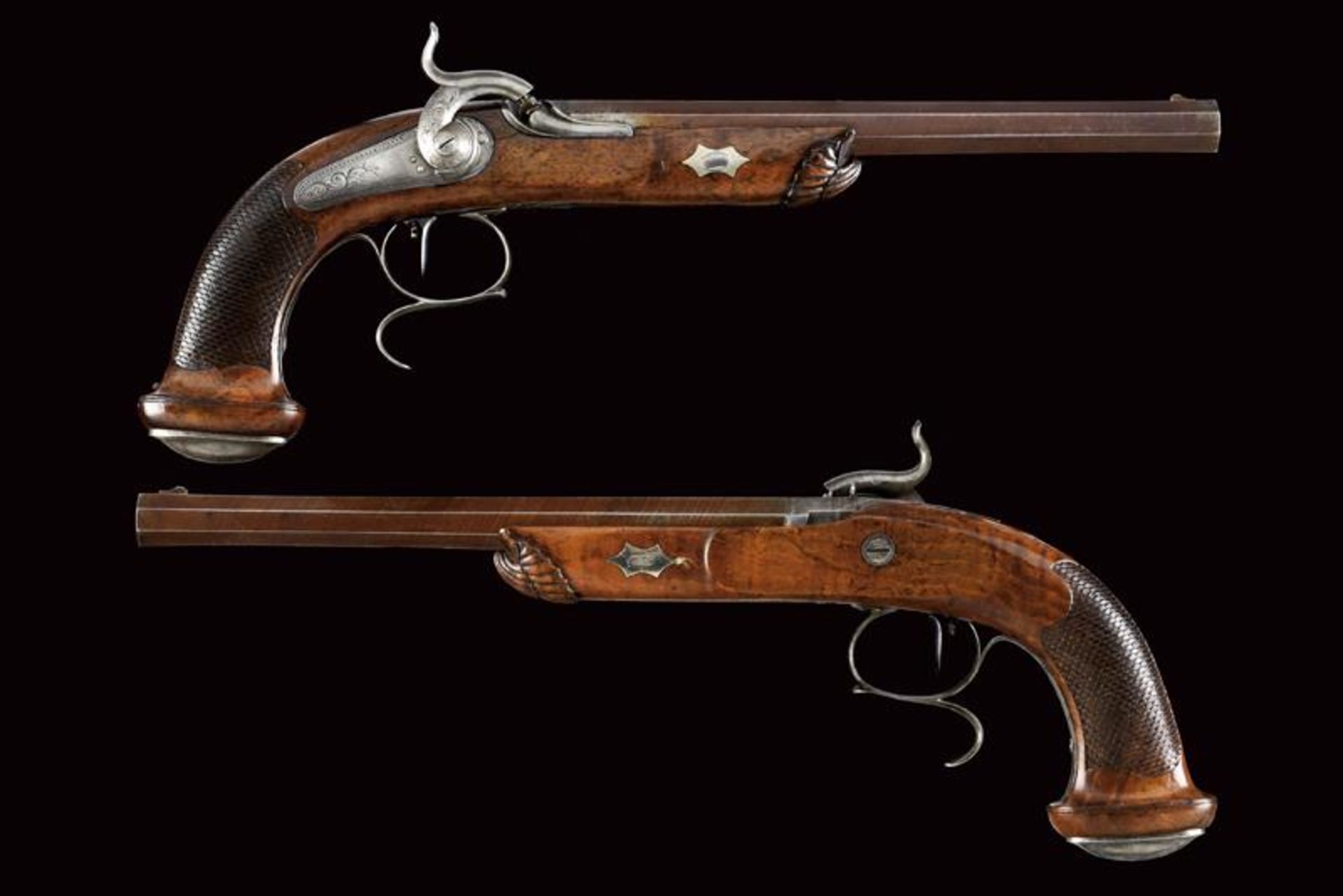 A pair of percussion target pistols with barrels signed Pirko
