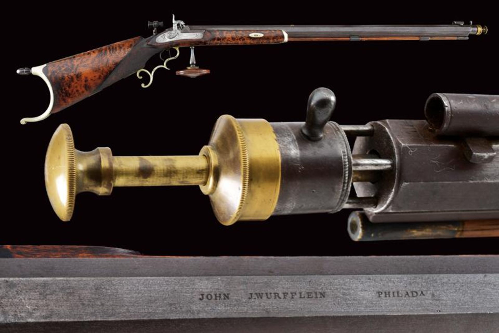 An elegant percussion target carbine by John J. Wurfflein with accessories
