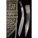 An interesting silver mounted kukri