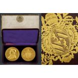 A lot of two presentation medals depicting Pope Pius IX's bust and coat of arms