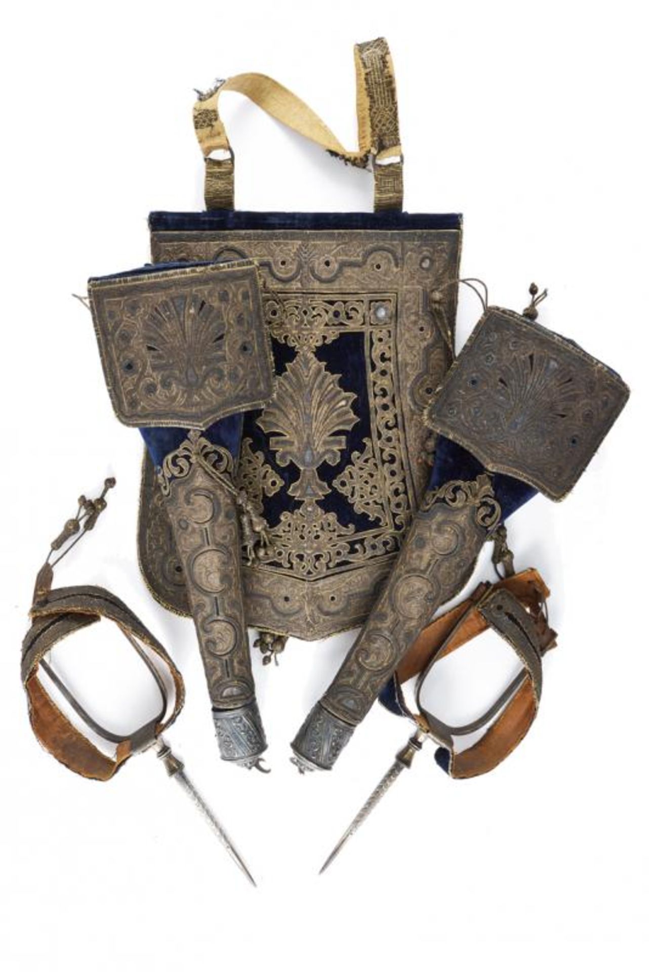 A fine ensemble of a pair of saddle holsters, spurs and a sabretache