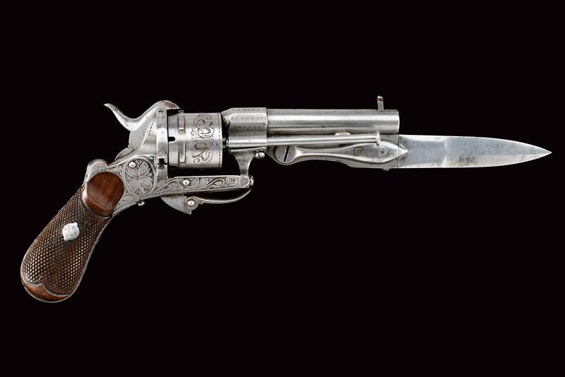 A rare pin-fire revolver with folding knife