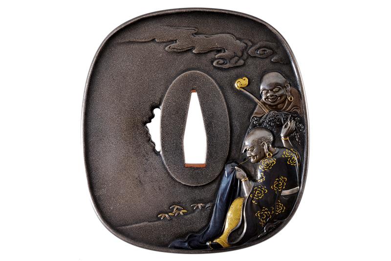 A beautiful tsuba signed Riuso Hogen (Kyotoshi)