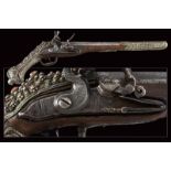 A beautiful silver mounted flintlock pistol in Ali Pasha style