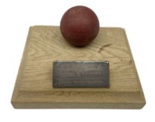 Raich Carter - early school cricket trophy of a cricket ball mounted on an oak base with white metal