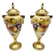 Pair of mid/late 20th century Royal Worcester vases and covers decorated by Frank Roberts