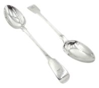 Pair of William IV silver Fiddle pattern basting spoons with engraved crest to terminals