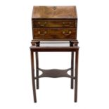 Georgian figured mahogany miniature bureau on stand - the fall front bureau with well fitted interio