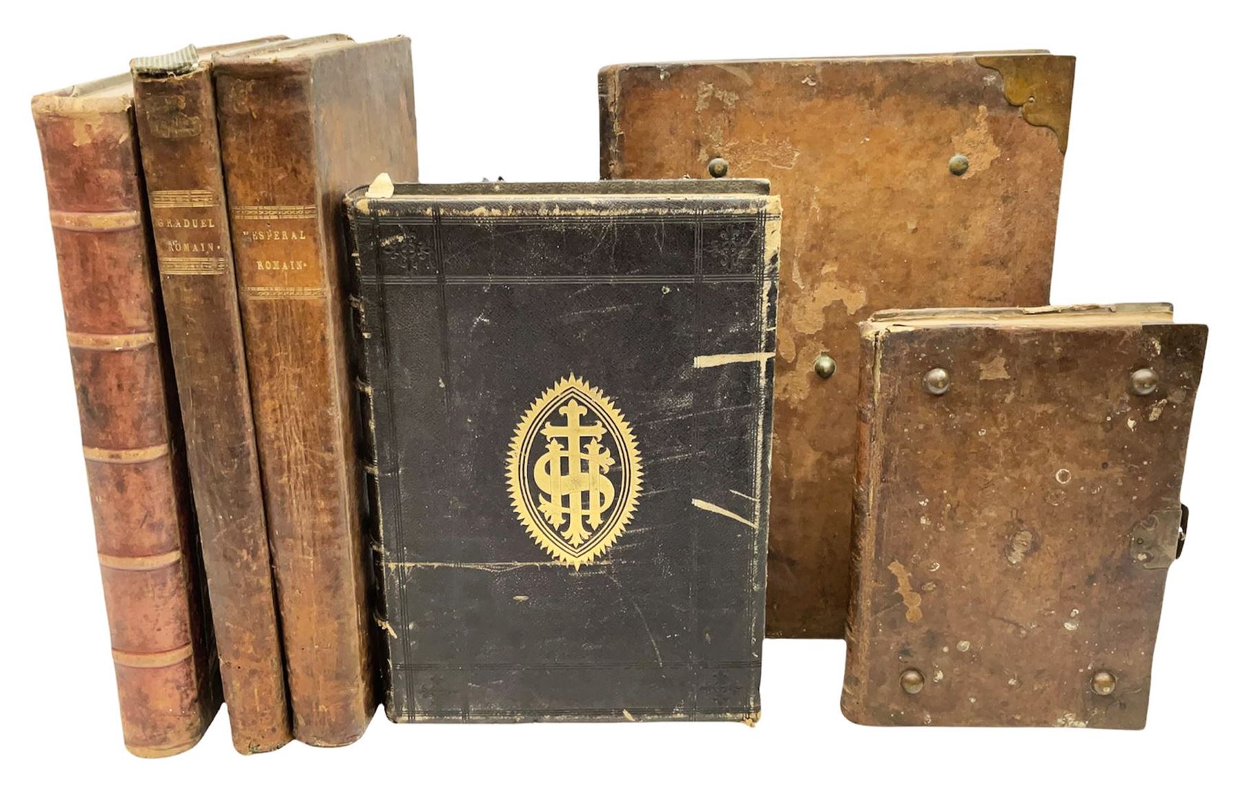 Six 19th century leather bound books of music comprising Graduale Juxta Missale Romanum and Antiphon