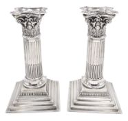 Pair of late Victorian silver Corinthian column candlesticks