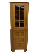 'Acornman' adzed oak corner cabinet