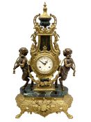 20th century continental gilt metal Lyre mantle clock on a raised plinth with paw feet and variegate