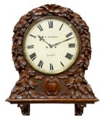 Mid-19th century eight-day Oak cased twin Fusee wall clock with integral support bracket