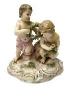 Meissen figure group modelled as two putto