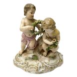 Meissen figure group modelled as two putto