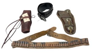 Two Wild West style leather holsters and two leather cartridge belts (4)