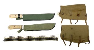 Two unmarked late 20th century machete knives with 37cm blades and fabric sheaths; pair of British A