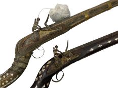 Two North African flintlock guns for restoration or wall display comprising blunderbuss with Moorish