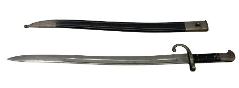 Turkish Model 1874 sword bayonet with 57.5cm curving steel fullered blade and chequered black grip