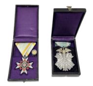 Two Japanese silver medals - Order of the Golden Kite 7th Class; and Order of the Sacred Treasure 6t