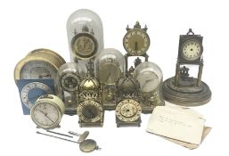 An assortment of 400-day torsion clocks for repair or spare parts.