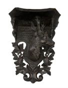 Carved Black Forrest style wooden wall bracket