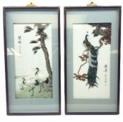 Two Oriental framed feather art pictures
