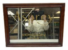 Mahogany wall mirror of rectangular form decorated with gilded 'Asprey
