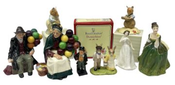 Eight Royal Doulton figures