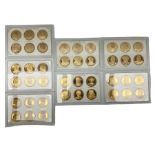 Seven cased sets of six 'British Monarchs' series medallions