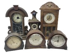 An assortment of mantle clocks and wall clocks for spares or repair