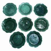 Eight Wedgwood green majolica leaf dishes