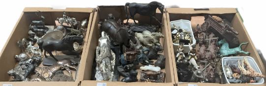 Quantity of metal and composite animal figures to include soapstone examples of horses and dogs etc