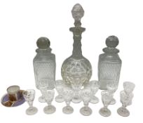 Pair of square sided cut glass decanters and stoppers