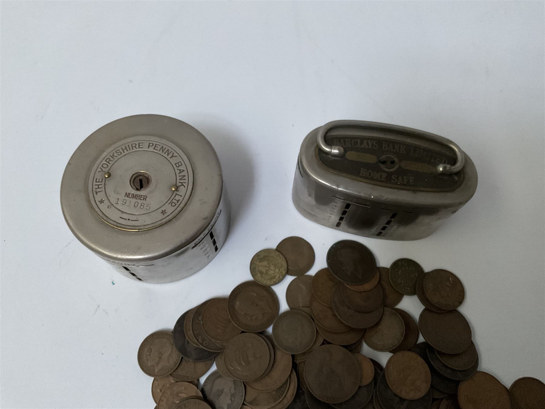 The Yorkshire Penny Bank Ltd money box containing coins and another Barclays Bank Limited Home Safe - Image 2 of 2