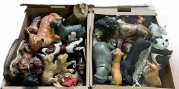 Two boxes of animal figures to include mainly ceramic and composite examples