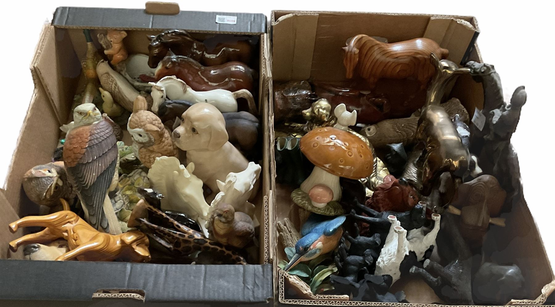 Two boxes of animal figures to include mainly ceramic and composite examples