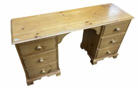 Solid pine dressing table fitted with six drawers