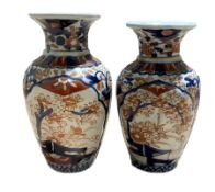Two Japanese baluster vases decorated in the Imari palette
