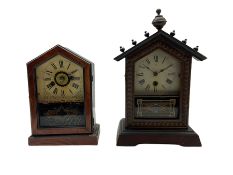 An American spring driven 30-hour 19th century timepiece shelf clock in a wooden case with a gable t