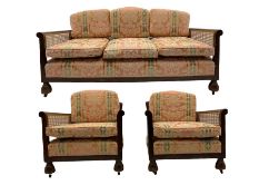 Early 20th century walnut framed three piece bergère lounge suite - two seat settee (W162cm)