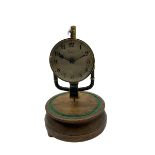A 1920's French 800-day Bulle electric battery clock on a turned wooden base