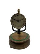 A 1920's French 800-day Bulle electric battery clock on a turned wooden base