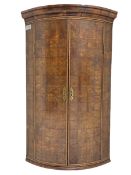 Yew wood bow front corner cupboard