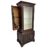 Mahogany display cabinet with hidden compartment