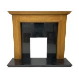 Oak fire surround with granite back and hearth