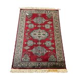 Persian red ground rug